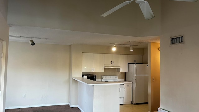 kitchen featuring white cabinets, white appliances, kitchen peninsula, and track lighting