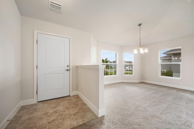 interior space with an inviting chandelier