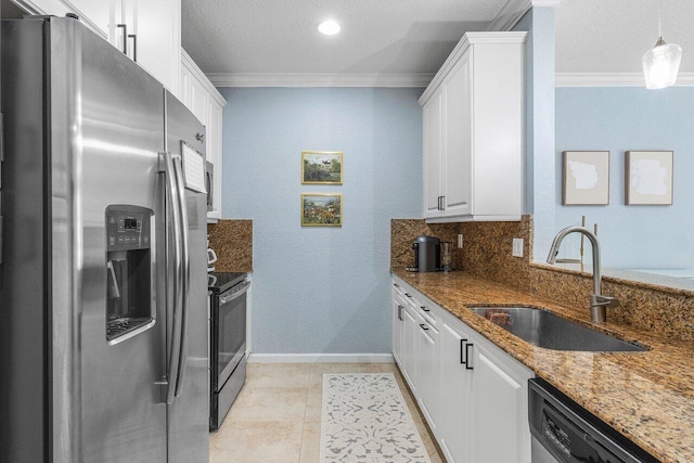 kitchen with sink, crown molding, white cabinetry, appliances with stainless steel finishes, and dark stone counters