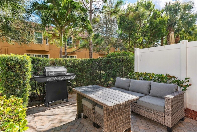 view of patio featuring an outdoor living space and area for grilling