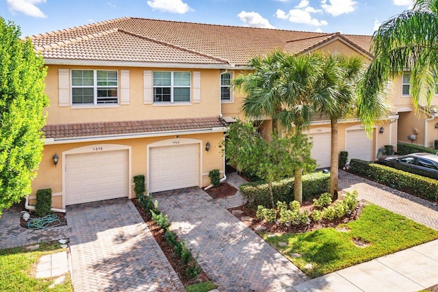 view of front of home with a garage