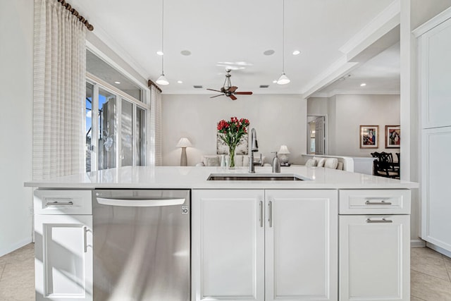 kitchen featuring sink, light tile patterned floors, stainless steel dishwasher, decorative light fixtures, and white cabinets