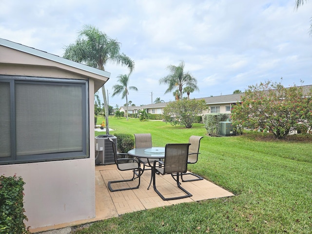 view of yard with a patio and cooling unit