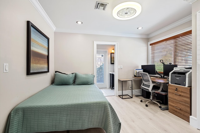 bedroom featuring light hardwood / wood-style flooring and ornamental molding