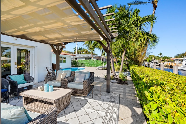 view of patio / terrace featuring outdoor lounge area, a pergola, and a water view