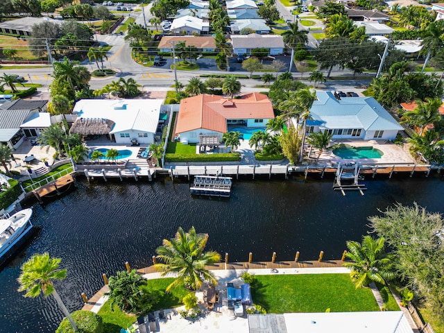 drone / aerial view with a water view