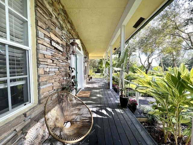 wooden deck featuring a porch