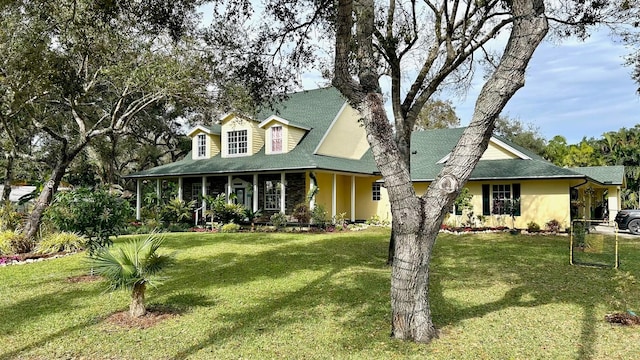 view of front of home with a front lawn