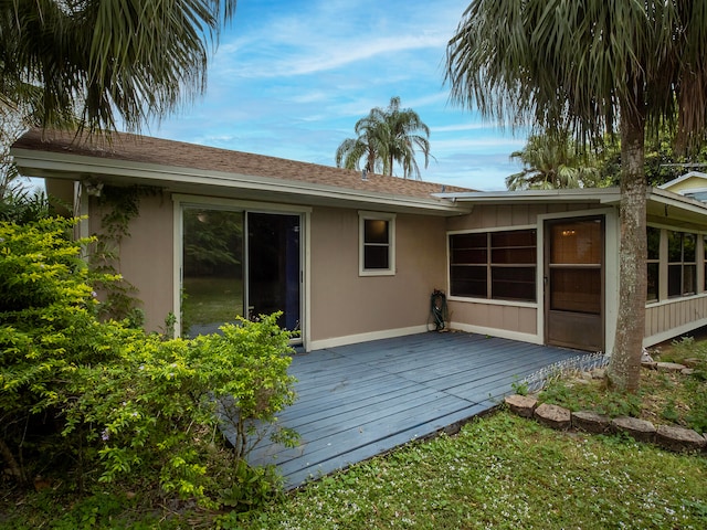 rear view of house with a deck