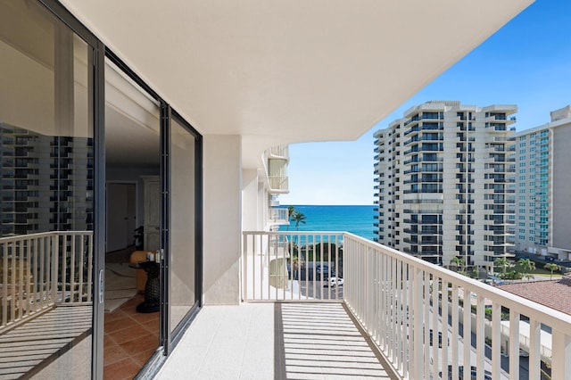 balcony featuring a water view