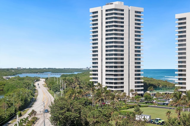 view of building exterior featuring a water view