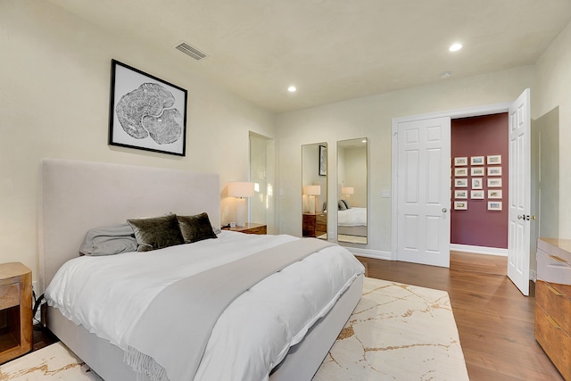 bedroom featuring light wood-type flooring