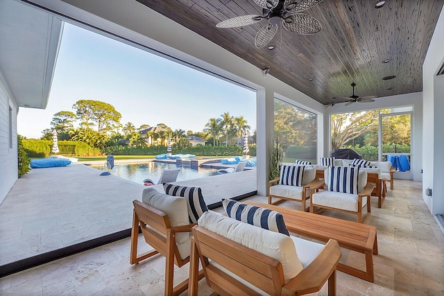 view of patio / terrace with ceiling fan and an outdoor hangout area