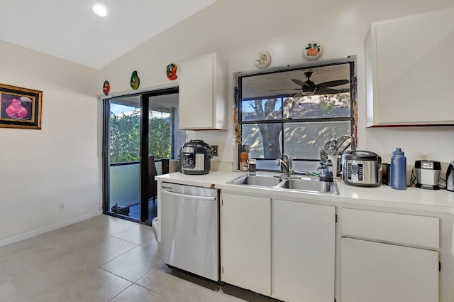 kitchen featuring white cabinetry, dishwasher, ceiling fan, sink, and vaulted ceiling