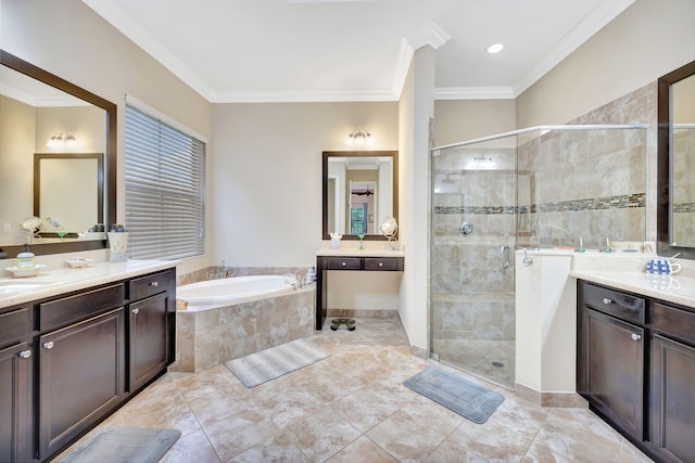 bathroom with vanity, shower with separate bathtub, and ornamental molding