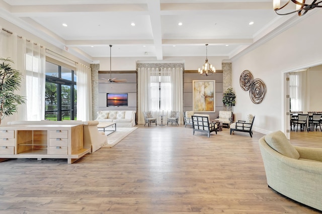 living room with coffered ceiling, ceiling fan with notable chandelier, light hardwood / wood-style flooring, ornamental molding, and beamed ceiling