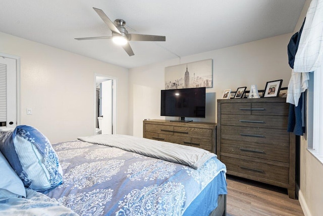 1638 Embassy Dr Unit 103, West Palm Beach, FL 33401 - bedroom with ceiling fan and wood finished floors