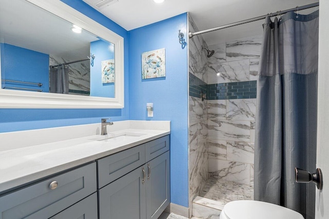 1638 Embassy Dr Unit 103, West Palm Beach, FL 33401 - full bath featuring toilet, vanity, and a tile shower