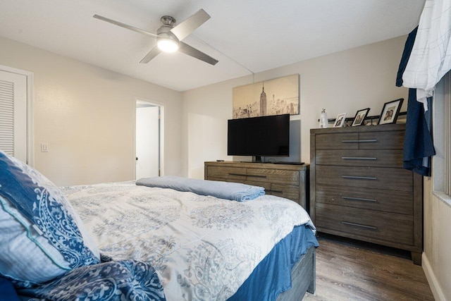 bedroom with hardwood / wood-style flooring and ceiling fan