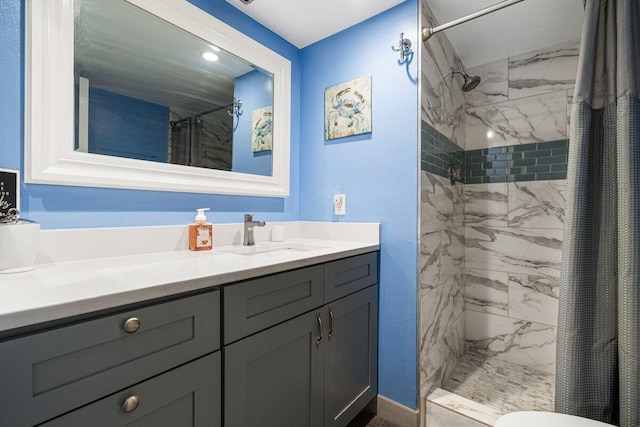 bathroom with a shower with curtain, toilet, and vanity