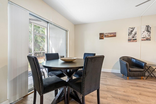 1638 Embassy Dr Unit 103, West Palm Beach, FL 33401 - dining space featuring light wood-style flooring and baseboards