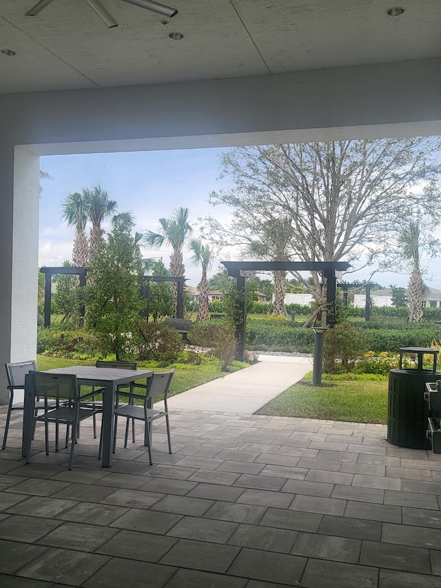 view of patio with ceiling fan