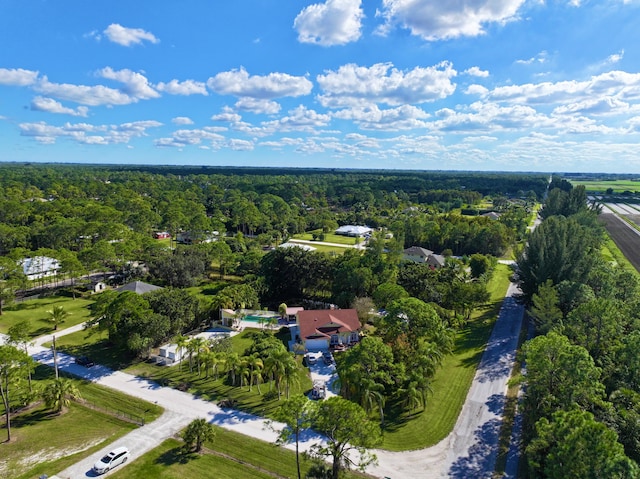 17976 88th Rd N, Loxahatchee, FL 33470 - aerial view of property and surrounding area featuring a heavily wooded area