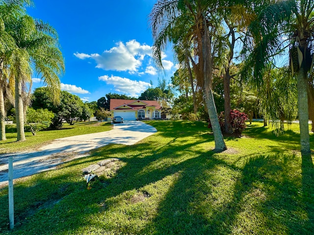 view of yard with a garage