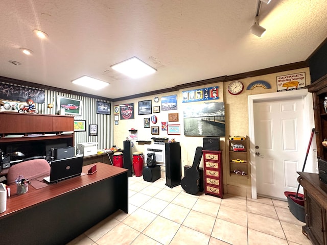 office area featuring light tile patterned floors, a textured ceiling, and crown molding