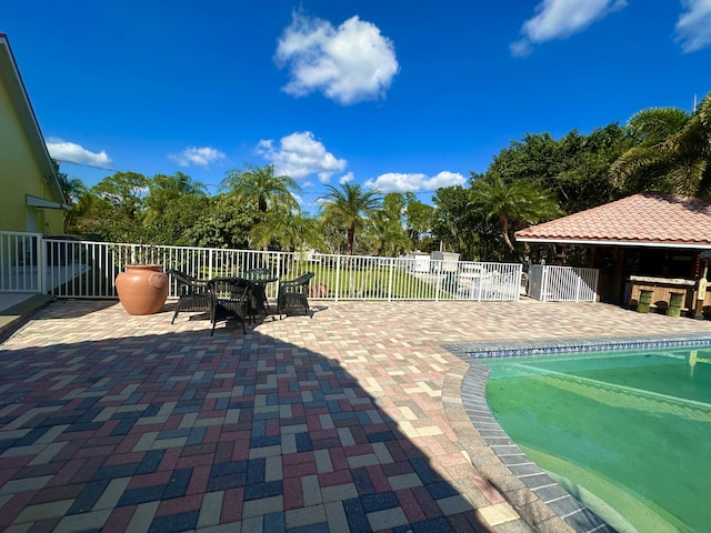 17976 88th Rd N, Loxahatchee, FL 33470 - view of swimming pool featuring a patio area