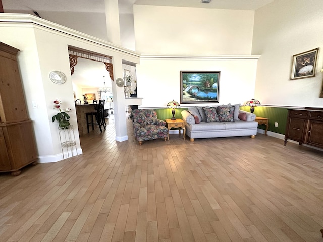 17976 88th Rd N, Loxahatchee, FL 33470 - living room with light wood-style floors and a towering ceiling