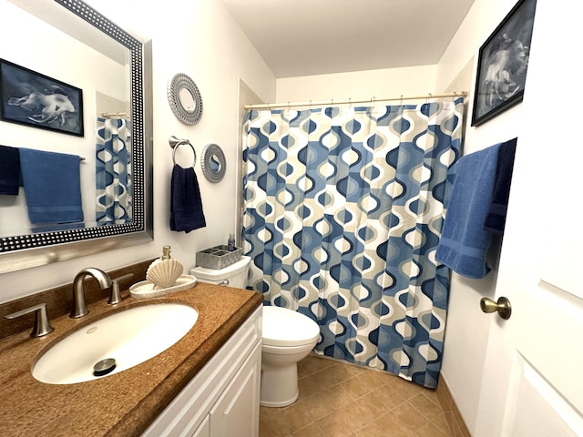 17976 88th Rd N, Loxahatchee, FL 33470 - bathroom with vanity, toilet, tile patterned floors, and a shower with shower curtain