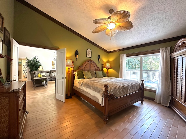 bedroom with ceiling fan, light hardwood / wood-style flooring, crown molding, and a textured ceiling