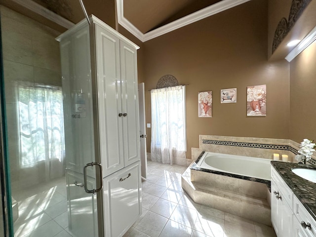 bathroom with tile patterned flooring, shower with separate bathtub, vanity, and crown molding