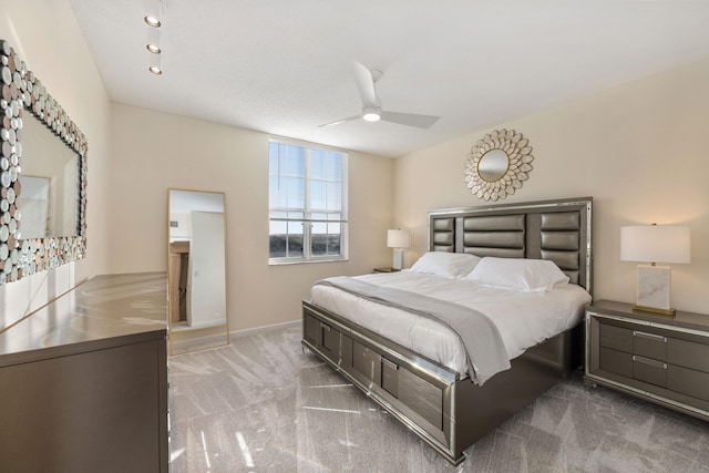 carpeted bedroom featuring ceiling fan