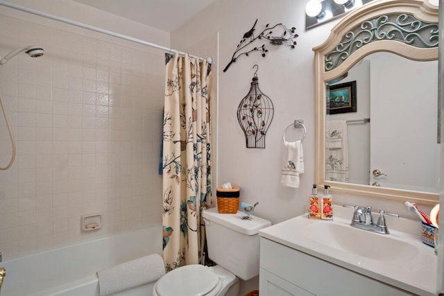 full bathroom with vanity, toilet, and shower / bath combo with shower curtain