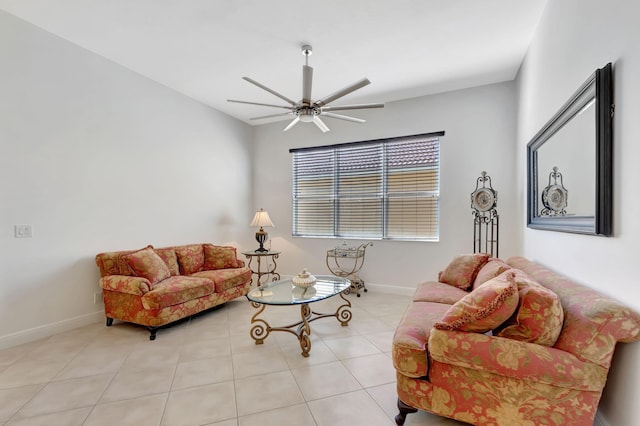 living room with ceiling fan and light tile patterned flooring