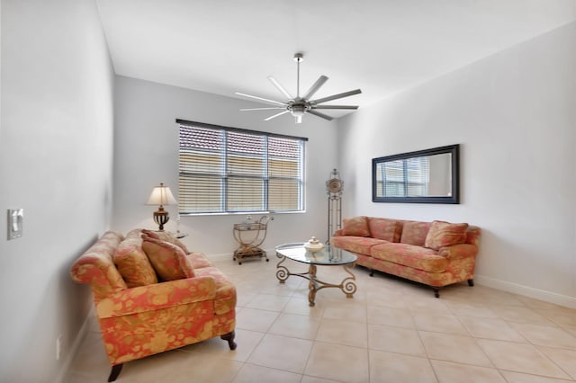 tiled living room with ceiling fan