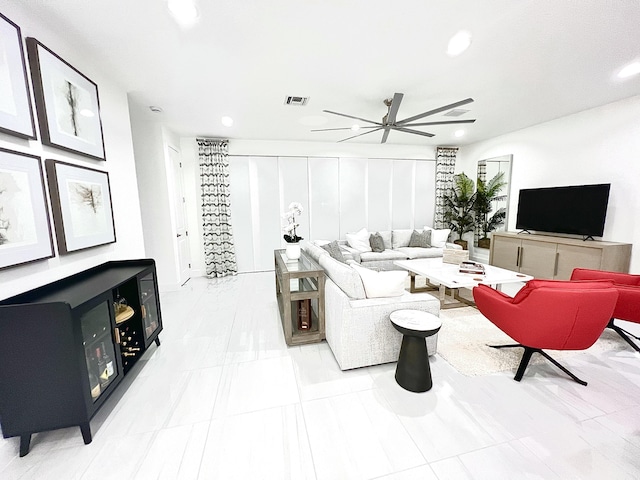 living room with ceiling fan