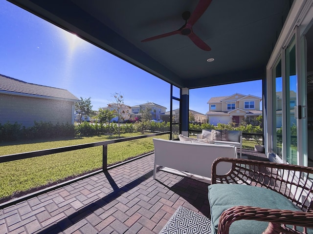 balcony featuring ceiling fan