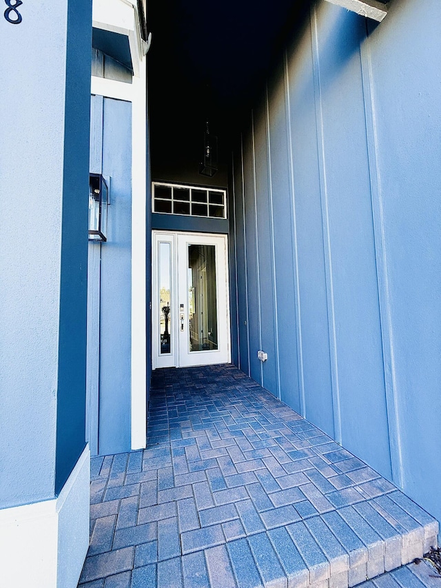 doorway to property featuring french doors