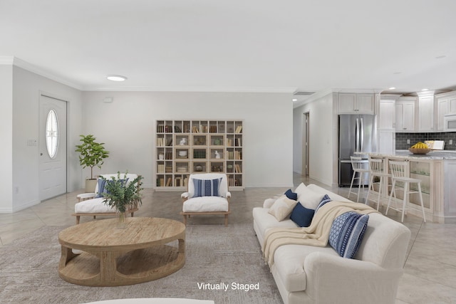 tiled living room with crown molding