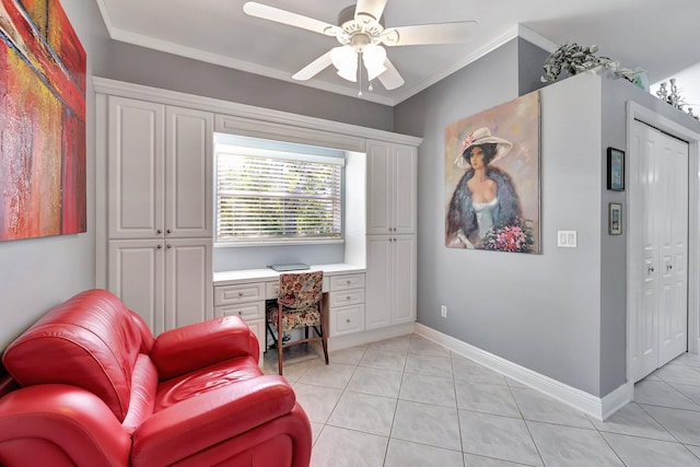 living area with light tile patterned flooring, ornamental molding, a ceiling fan, and built in study area