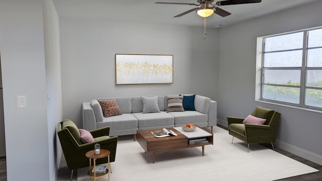 681 Flanders O, Delray Beach, FL 33484 - living area featuring baseboards and a ceiling fan