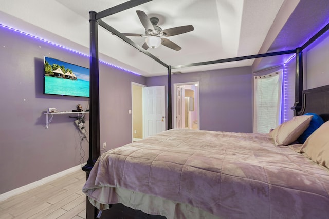 bedroom featuring ceiling fan and light hardwood / wood-style flooring