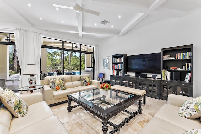 living room with beam ceiling, ceiling fan, and coffered ceiling