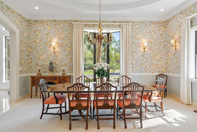 carpeted dining room featuring crown molding and a notable chandelier