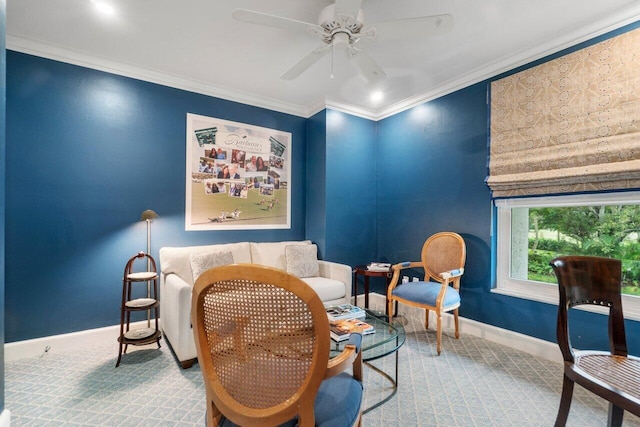 living area featuring crown molding and ceiling fan