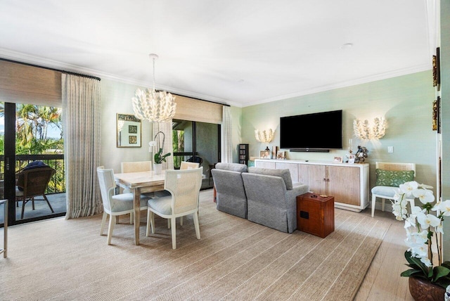 dining room featuring ornamental molding and a chandelier