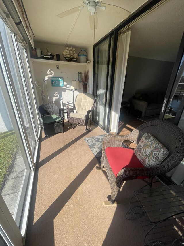 interior space featuring ceiling fan